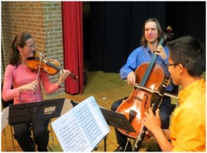 NBSO musicians, Emmy, Peter and Randolph perform at over 50 local schools.