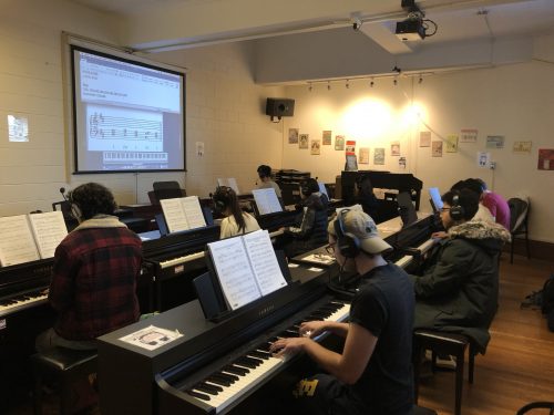 students in piano lab image