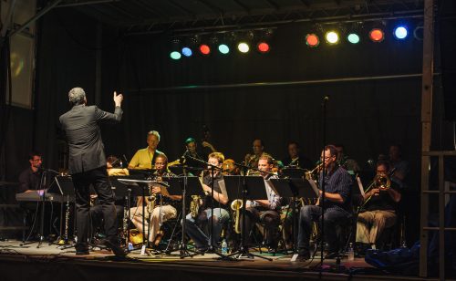 Music Educators Jazz Ensemble onstage with conductor