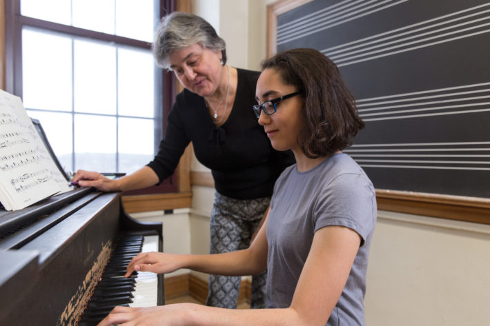 Student receiving private piano lessons