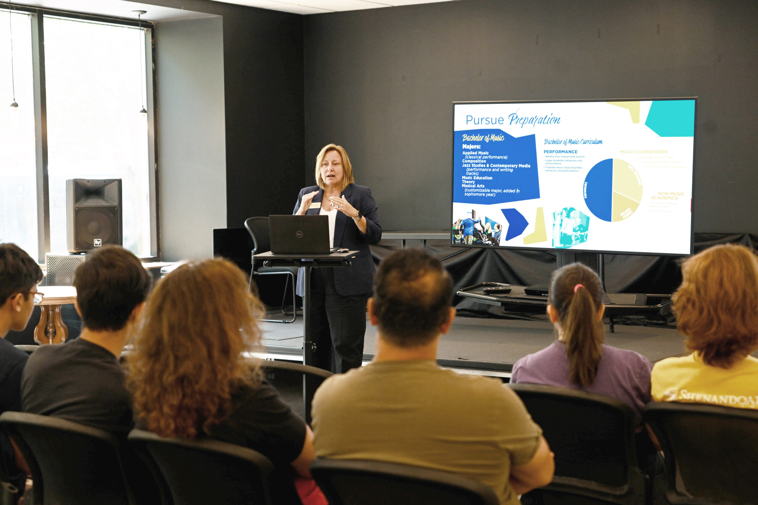 ESM Staff Member, Christine Burritt, leading an information session in the Miller Center at Eastman School of Music