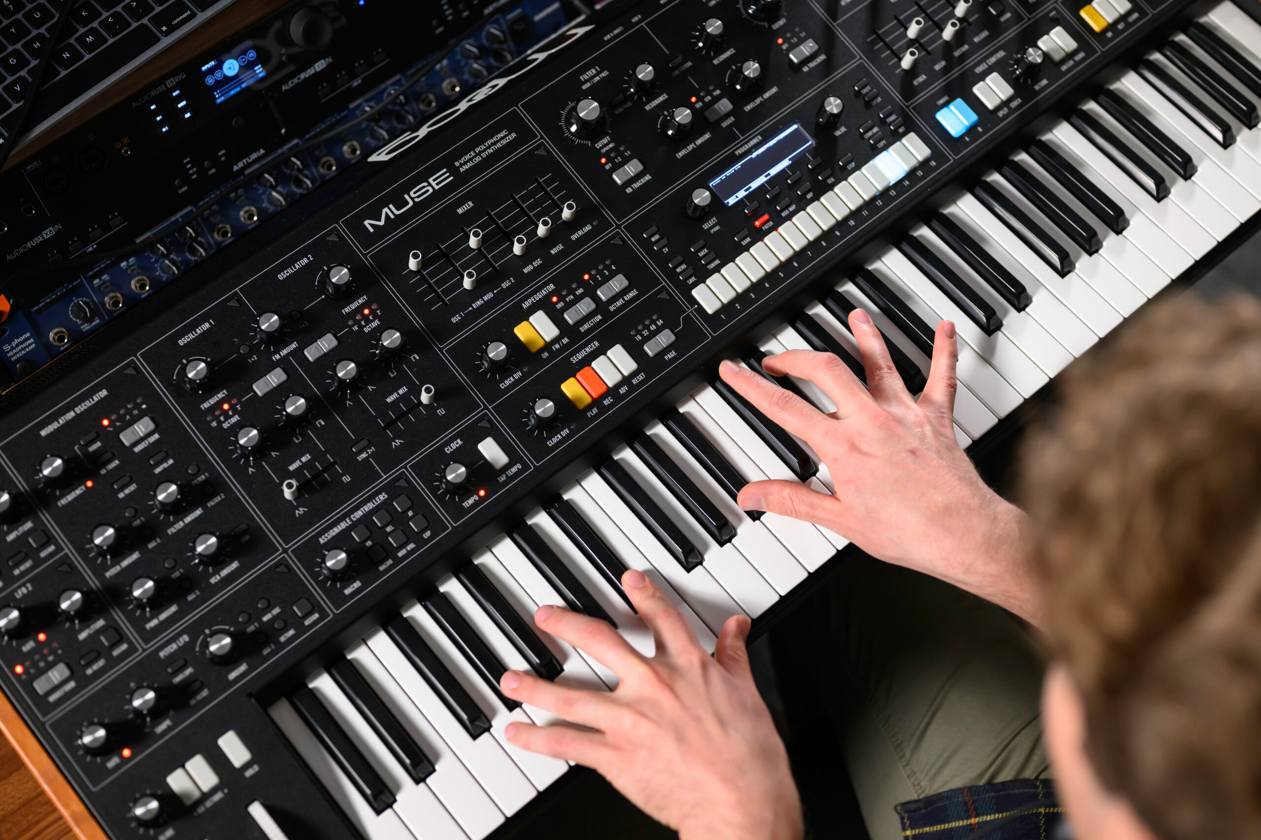Rick Carl '19 (audio and music engineering), '20 MS (electrical and computer engineering), a hardware/firmware engineer at the synthesizer company Moog who has designed some of their synthesizers including the Labyrinth and the Muse (pictured), is pictured in the new synth lab in the Computer Studies Building October 29, 2025. // photo by J. Adam Fenster / University of Rochester