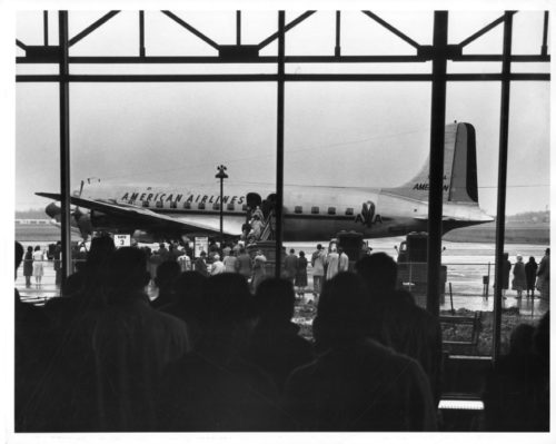 1 ESPA 8x10 22-53 Members of the Eastman Philharmonia preparing to board their plane at Rochester
