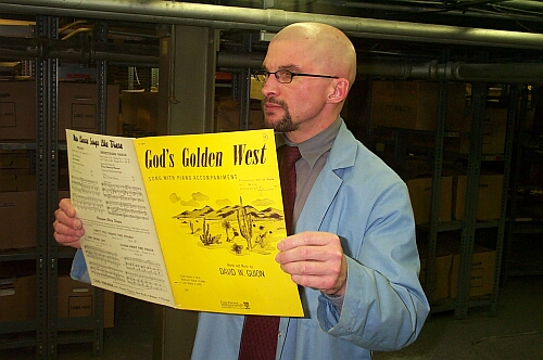 David Peter Coppen peruses a permanently out-of-print sheet music title that had just been requested through the archival reprint service.