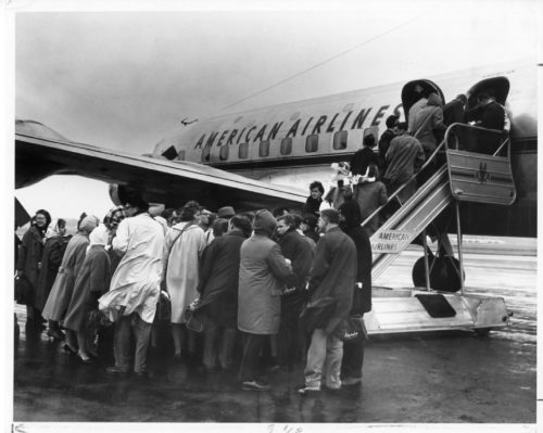2 ESPA 8x10 22-90 Members of the Eastman Philharmonia preparing to board their plane at Rochester