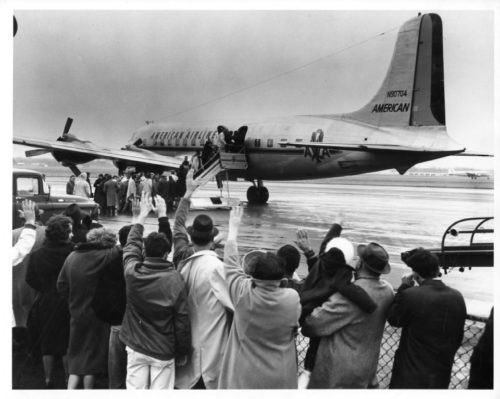 3 ESPA 8x10 7-1 Members of the Eastman Philharmonia preparing to board their plane at Rochester