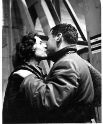 Joyous reunions taking place inside the airport terminal as family members and friends greet the returning members of the Eastman Philharmonia.