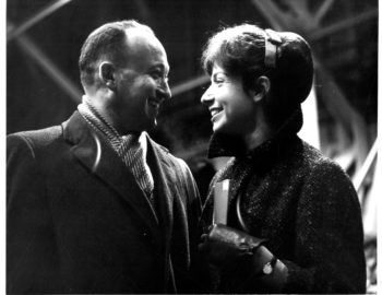 Joyous reunions taking place inside the airport terminal as family members and friends greet the returning members of the Eastman Philharmonia. Eastman School Photo Archive