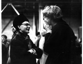 Joyous reunions taking place inside the airport terminal as family members and friends greet the returning members of the Eastman Philharmonia. Eastman School Photo Archive