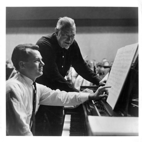 Conductor Hanson and soloist John La Montaine during rehearsal for the Carnegie Hall concert. Eastman School Photo Archive.