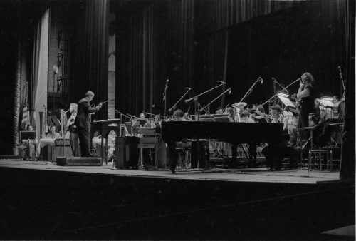 Director Ray Wright and Eastman student-performers on-stage in the Eastman Theater on the occasion of the Eastman Studio Orchestra’s public debut.