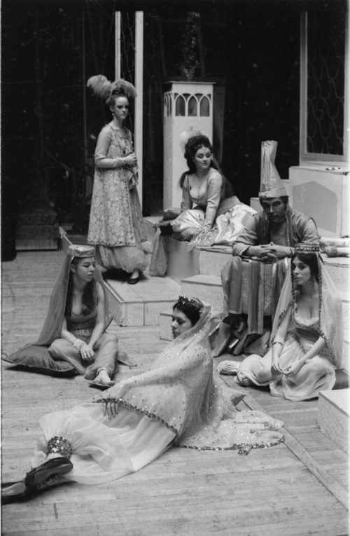 Members of the cast in repose during dress rehearsal.