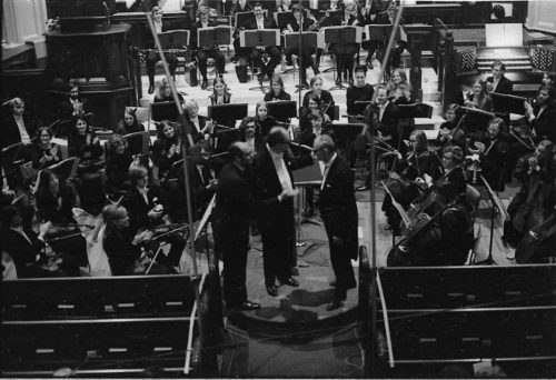 R1307-18A With the members of the Eastman Philharmonia in place, conductor Walter Hendl, organist David Craighead, and composer Samuel Adler acknowledge the applause after the performance of the Concerto for Organ and Orchestra.