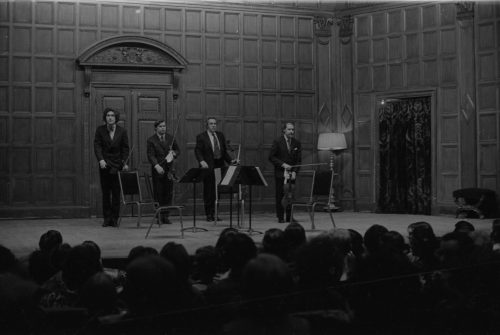 The members of the Guarneri Quartet acknowledge applause in Kilbourn Hall.