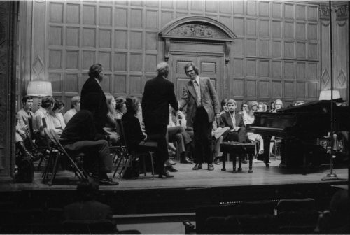 Guest artist Rudolf Serkin in master class with Eastman School students on the stage of Kilbourn Hall.