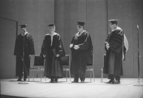 Conferral of the honorary Doctor of Music degree on guest artist Rudolf Serkin. UR President W. Allen Wallis presides; Director Walter Hendl presents the degree and reads the citation; and Assistant Director Daniel R. Patrylak hoods the newly designated Dr. Serkin.