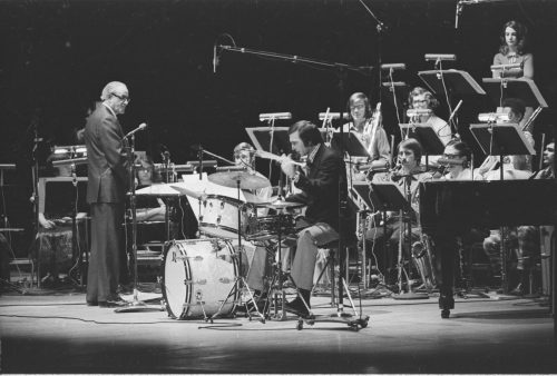 Jack End and the members of the Eastman Jazz Ensemble on-stage in the Eastman Theater; Professor John Beck is percussion soloist. April, 1972. Photos by Louis Ouzer.