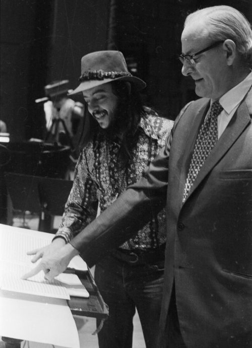 Two Directors of the Eastman Jazz Ensemble, Chuck Mangione (1968-72) and Jack End (1967-68) comment on a point in the score during rehearsals for the performances of April 14th and 15th, 1972. Photo by Louis Ouzer.