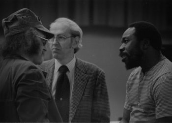 Thad Jones in conversation with Ray Wright and an unidentified member of the Eastman Jazz Ensemble
