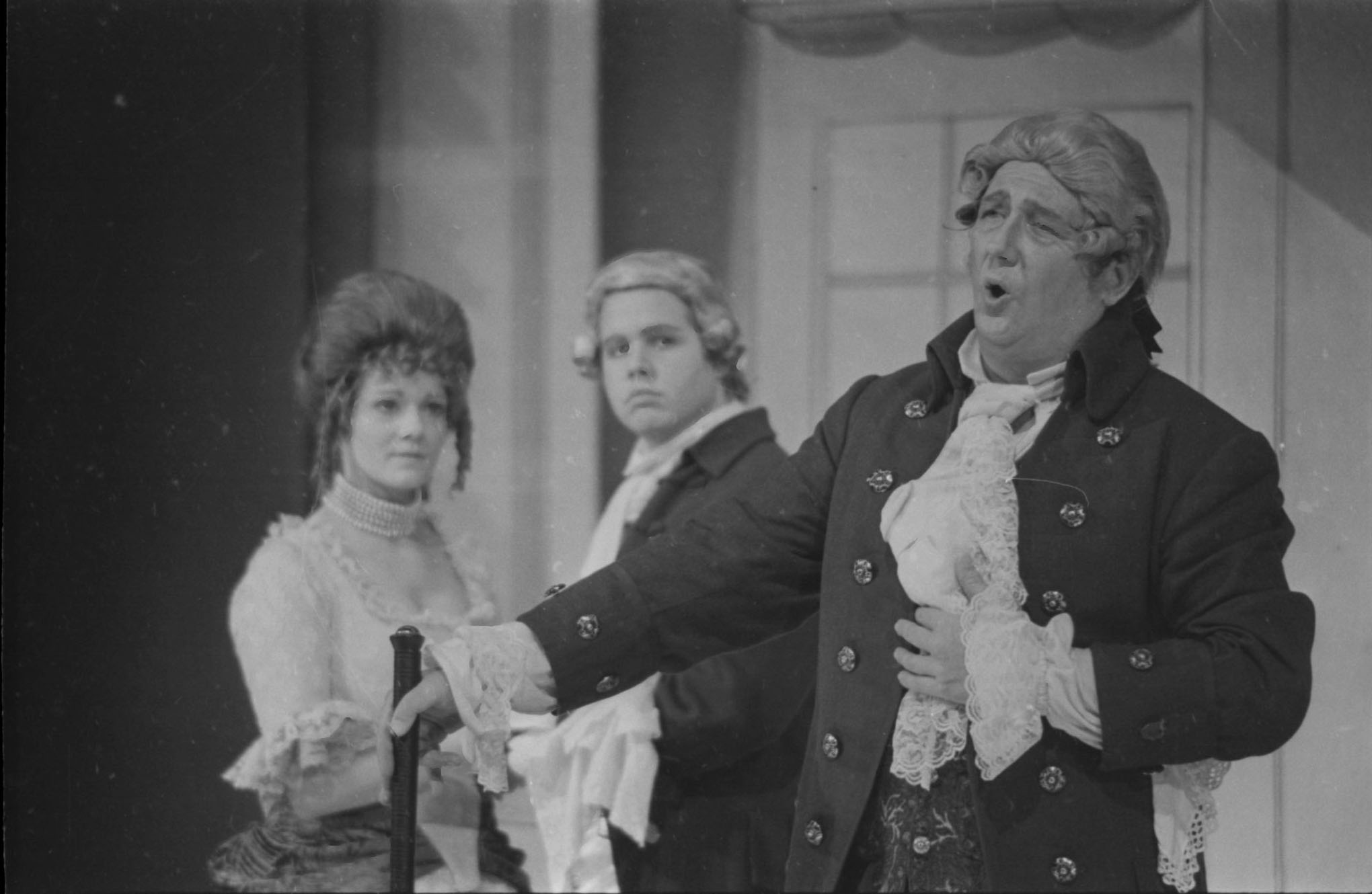 After the Humorists’ scheme has been exposed and the Dupes have been shown up in their folly, Washball sings his lament “Ah! Woe is me” while his niece Miss Lucy and her betrothed, Meanwell, look on.