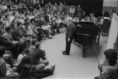 Violinist Isaac Stern addressing the assembled listeners during a master class at the Eastman School on February 19th, 1982.