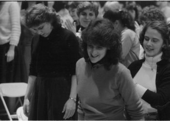 R3243-3A On the day of the recording session, December 10th, 1983, members of the chorus and the vocal soloists all participate in preliminaries.