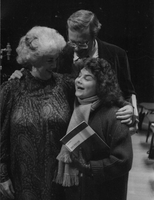 ALT TEXT: Mezzo soprano Jan DeGaetani shares a convivial moment with her husband oboist-conductor Philip West and her student, soprano Jane Adler (BM 1982, MM 1984) following the recording session on December 10th, 1983.