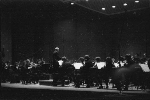 The Eastman Philharmonia performs under Sir Georg Solti’s direction in the Eastman Theater on April 7th, 1987.