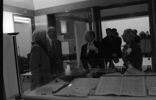 Ted Honea, Special Collections Librarian and Archivist, narrates an exhibit for guests