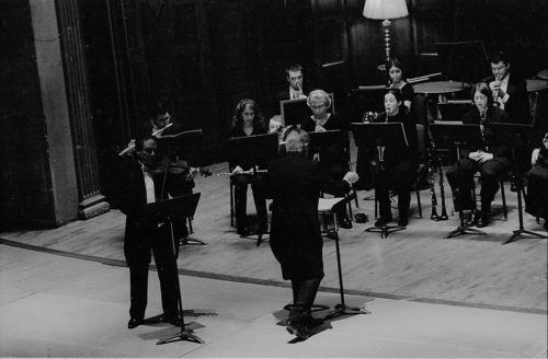 R4336-21 The Eastman Wind Ensemble concert on November 11th included a performance of the rarely heard Violin Concerto featuring faculty artist Charles Castleman as soloist. A vocal ensemble of six Eastman students was featured in the performance of Weill’s Mahagonny Songspiel with texts by Bertolt Brecht. The Eastman Wind Ensemble concert on November 11th included a performance of the rarely heard Violin Concerto featuring faculty artist Charles Castleman as soloist. A vocal ensemble of six Eastman students was featured in the performance of Weill’s Mahagonny Songspiel with texts by Bertolt Brecht.