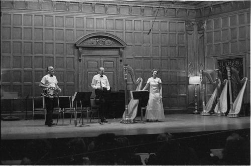 Eastman School faculty members Verne Reynolds, Robert Sprenkle and Eileen Malone on-stage in Kilbourn Hall on the occasion of the premiere performance of Alec Wilder’s Suite for Harp, Oboe and French Horn, June 28th, 1969, at the 6th national conference of the American Harp Society.