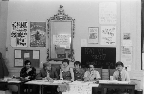 Students managing the peace activities information station in the main hall