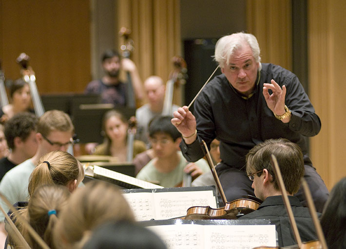 Neil Varon, Eastman’s director of orchestral activities, shown here in rehearsal with the Eastman Philharmonia