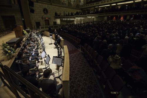 Eastman Trombone Choir, conducted by Mark Kellogg (standing) and Larry Zalkind, plays as graduates enter. // University of Rochester Eastman School of Music Commencement Ceremony, Kodak Hall at Eastman Theatre May 15, 2016.  // photo by J. Adam Fenster / University of Rochester