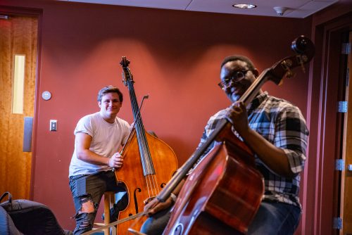 Two double bass students rehearsing