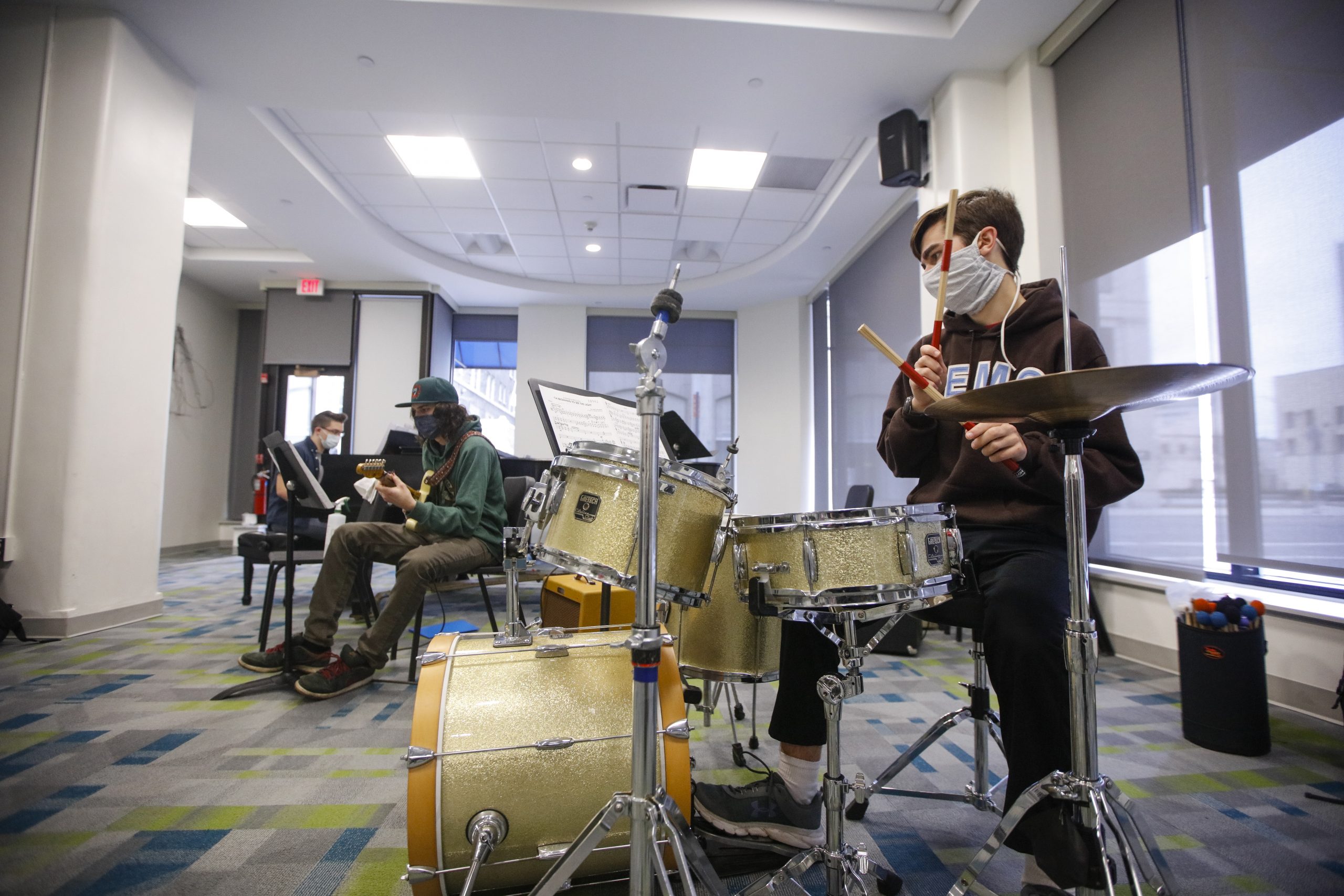 Percussion player on drumset