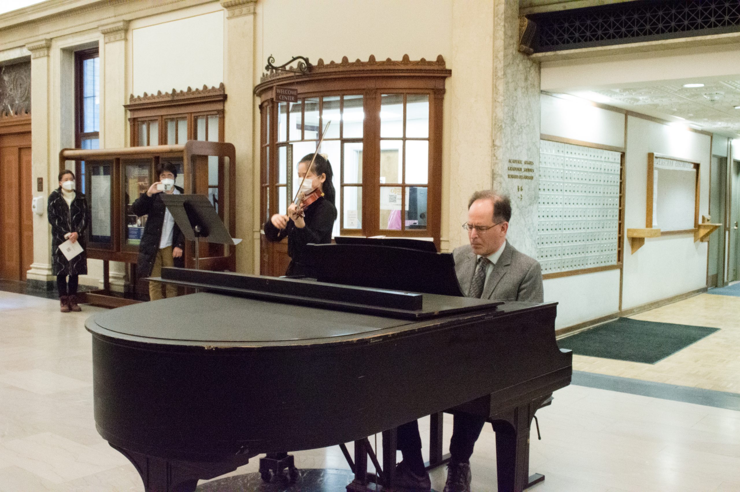 DMA student violinist Junheng Chen and Professor of Music Theory David Temperley in Lowry Hall;