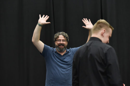 Patrick Diamond leads students in a dance warm up at a recent Eastman Opera Theatre rehearsal. Photo by Lauren Sageer.