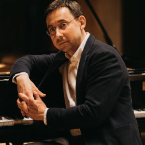 Alex Kobrin at piano headshot