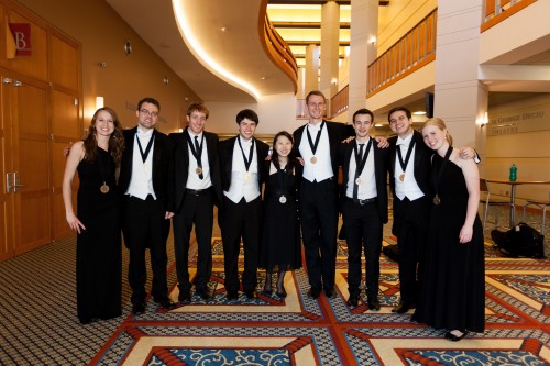 Members of Project Fusion and Midic Winds pose with their medals after the completion of the 2013 Fischoff National Chamber Music Competition. From left: Rebecca Tobin, Matt Evans, Quinn Delaney, Matt Amedio, June Kim, Michael Sawzin, Russell Rybicki, Dannel Espinoza, Johanna Gruskin. (Photo courtesy of Fischoff National Chamber Music Association and  photographer Josef Samuel.) 