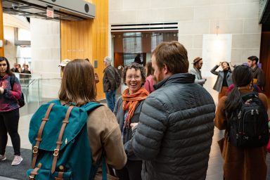 Holly-interacts-with-students-in-the-Glenn-Watkins-after-party