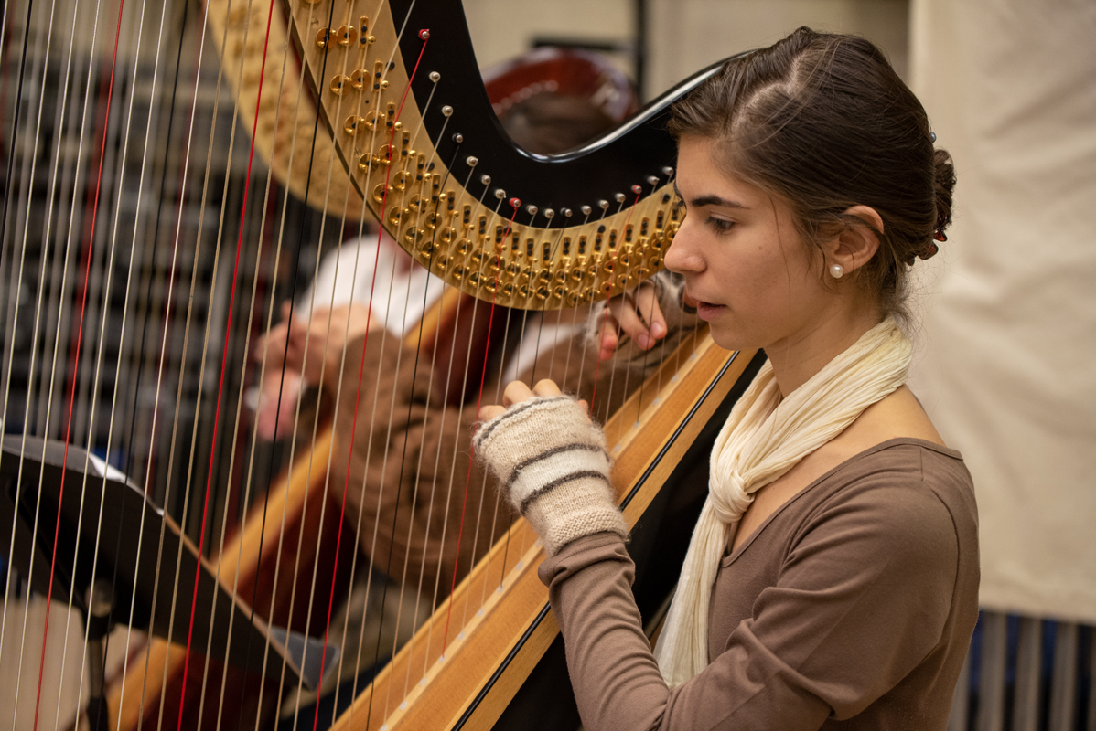 Harp student in rehersal