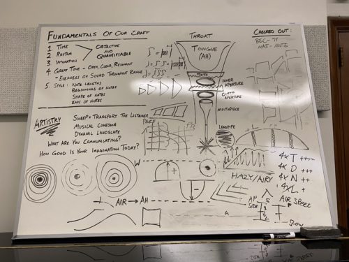 Benavidez keeps a whiteboard scribbled with fundamentals in his studio, with artistry as a main component he stresses to students.