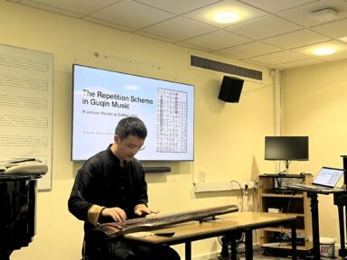 PhD candidate Ruixue Hu giving a lecture-recital at Oxford University
