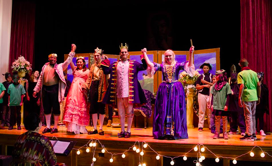 image of students in opera costume on stage