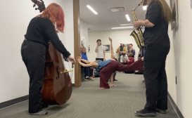 A bassist and saxophonist from OSSIA new music perform with BIODANCE at the University of Rochester.