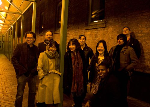 Standing, first row, left to right: Futaba Niekawa, Olga Krayterman, Jung Sun Kang. Standing, second row (back row), left to right: Spencer Phillips, Matthew Witten, Christopher Collins, Forrest Green. Standing, back right: Tyler Farren. Seated, front: Nicholas Wiggins. Not pictured: Matt Werts