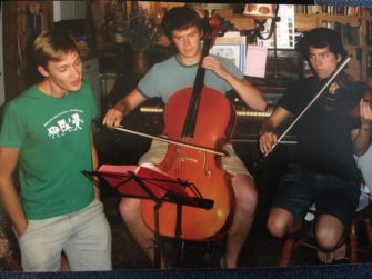 Ward, Lykins, and Peña reading music together in 2009