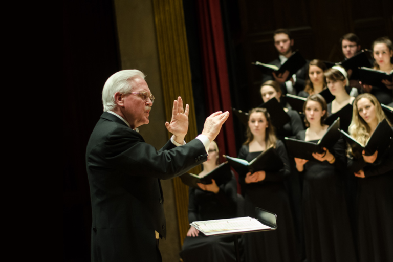 Bill Weinert conducting chorus image