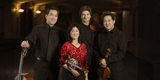 YingQuartet_multi-2 Ying Quartet stand with instruments in Eastman Theatre lobby